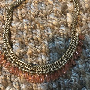 Melon and gold necklace